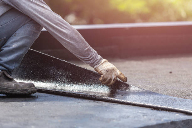 Professional Basement Waterproofing technician working in Fairfield, AL